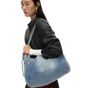 Blue denim zippered shoulder bag with braided strap and embroidered Desigual logo for casual use