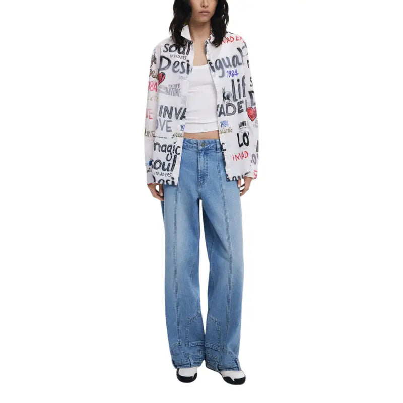 Women’s white printed long sleeve cotton blouse paired with light blue wide-leg jeans and white shoes