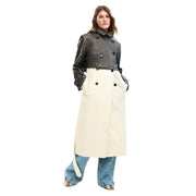 A black leather cropped jacket with silver buttons and double-breasted design paired with a beige belted blazer