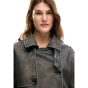 Dark gray faux leather trench coat with black buttons and contrasting stitching paired with desigual beige belted blazer with pockets