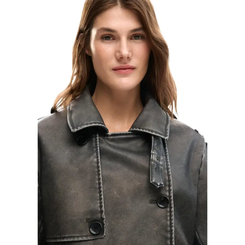 Dark gray faux leather trench coat with black buttons and contrasting stitching paired with desigual beige belted blazer with pockets
