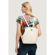 White quilted Desigual women beige backpack with adjustable shoulder straps front zipper and inside pocket