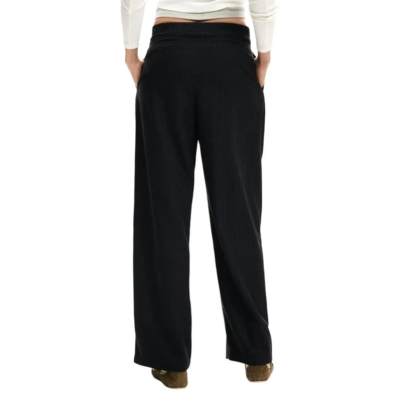 Black wide-leg Desigual women zip trousers with high-waisted elastic band and front pockets polyester blend