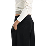 Desigual women black zip wide-leg trousers with high waistband made of soft polyester blend fabric