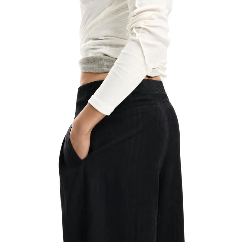 Desigual women black zip wide-leg trousers with high waistband made of soft polyester blend fabric