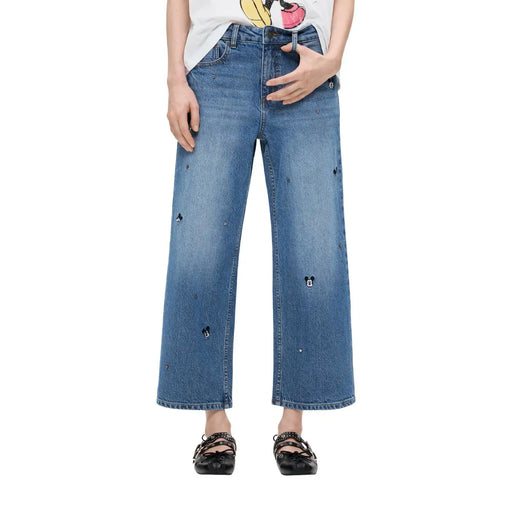Jean Desigual pour femme en denim de coton bleu à jambes larges, orné d'une broderie ludique représentant Mickey Mouse noir.