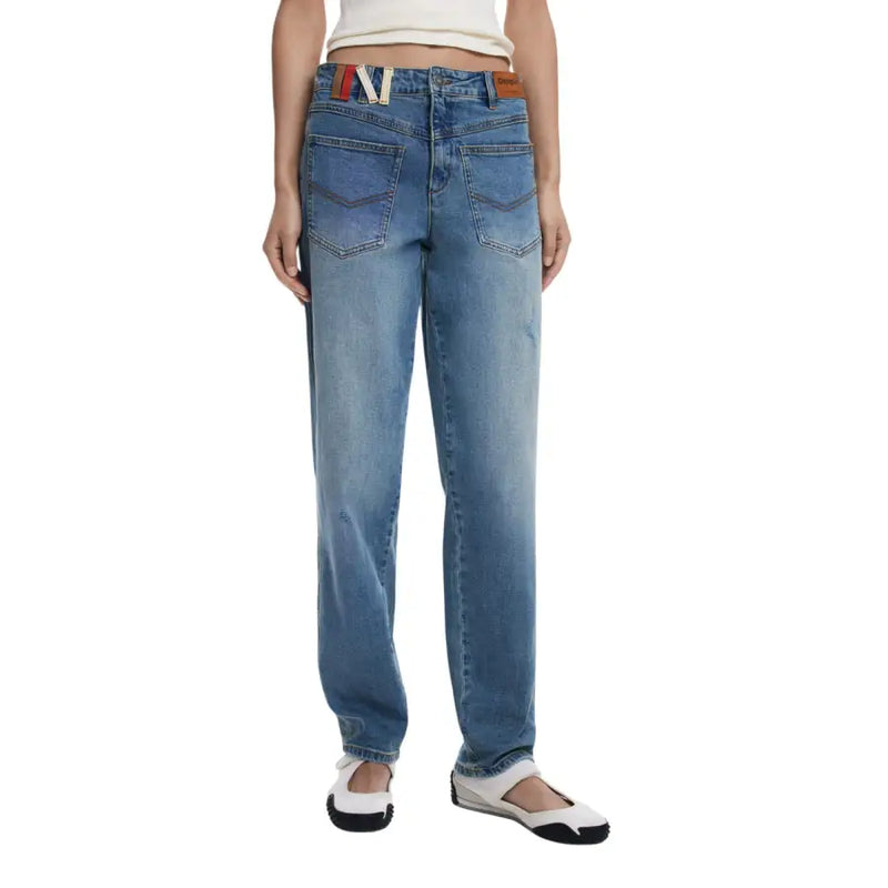 Light-wash blue relaxed-fit jeans with brown leather patch from Desigual Women Fall Winter collection