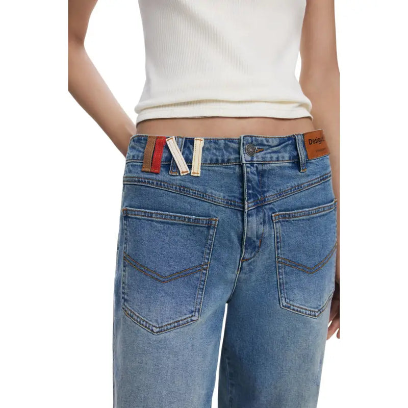 Light blue denim jeans with a brown leather patch from Desigual Women Blue Fall Winter collection