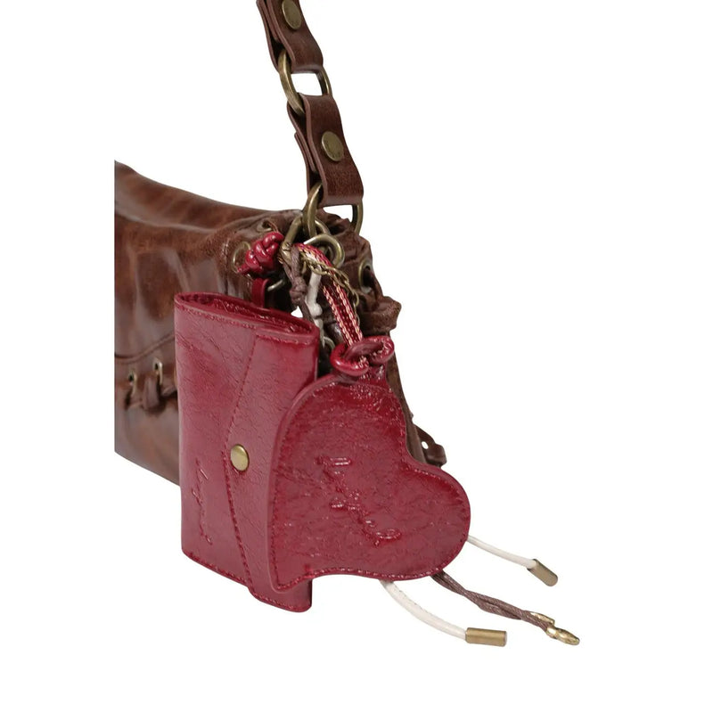 Desigual women brown faux leather bag 17 cm shown as a glossy red heart-shaped wallet with textured surface and gold hardware