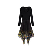 Black viscose long-sleeved womens dress by Desigual with solid bodice and pleated asymmetrical floral skirt in earth tones