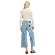 Back side of desigual women jeans in light blue cotton denim with mickey mouse embroidery on the pocket
