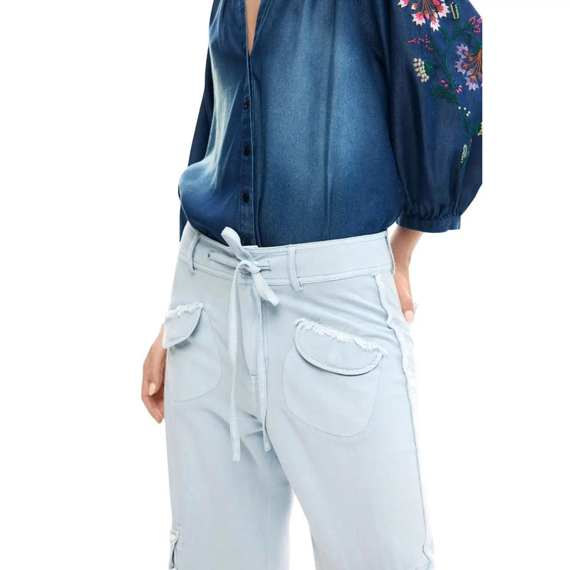 Light blue cotton denim trousers for women by Desigual with frayed pocket edges and matching drawstring waistband
