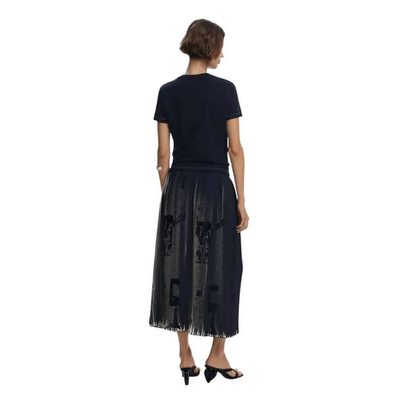 Women wearing a black short-sleeve t-shirt and midi skirt set for fall winter fashion