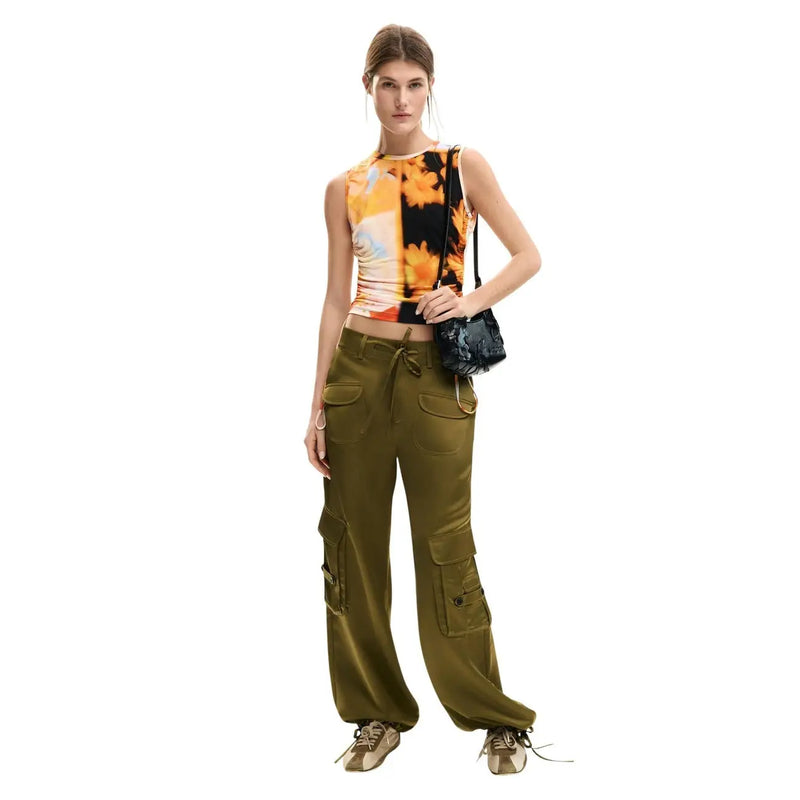 Olive green cargo pants with multiple pockets and drawstring waistband paired with desigual women sleeveless floral viscose top