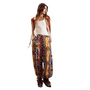 Desigual women trousers mustard viscose with belt featuring vibrant wide-leg design and bold gold blue maroon pattern