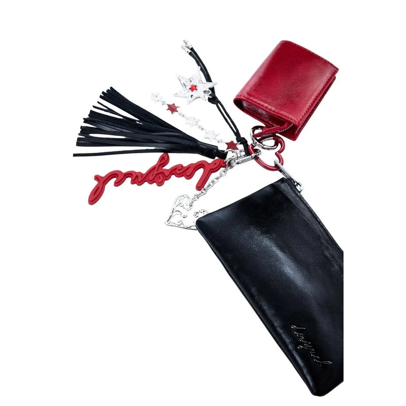 Red and black leather keychain with star charms tassels and silver heart pendant attached to desigual women wallet black polyurethane zip