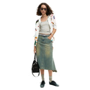 Black studded shoulder bag with sleek minimalist design paired with desigual women white floral long cotton shirt