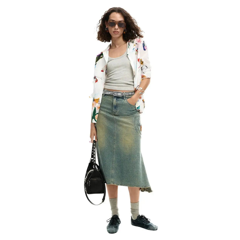 Black studded shoulder bag with sleek minimalist design paired with desigual women white floral long cotton shirt