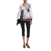 Women wearing Desigual white and grey floral long-sleeve V-neck knitwear top