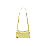 A sleek pale yellow leather Desigual crossbody handbag with minimalist design adjustable strap and pockets