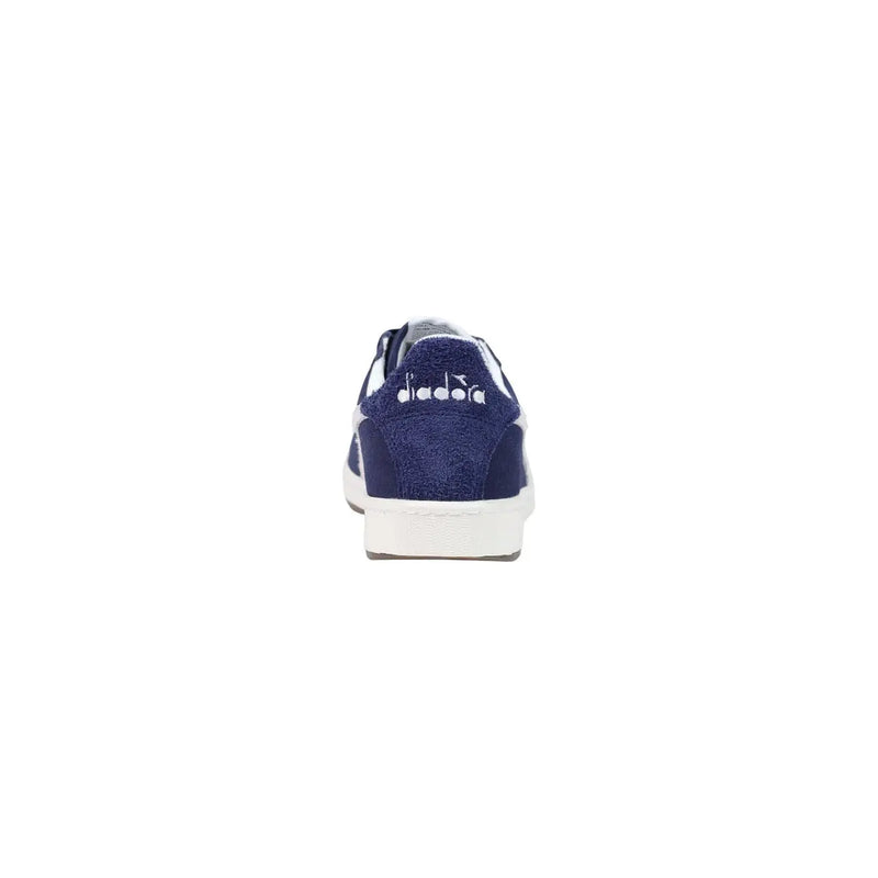 daim bleu marine Diadora Baskets basses de jeu en cuir pour homme avec semelle en caoutchouc blanc et surpiqûres blanches contrastantes