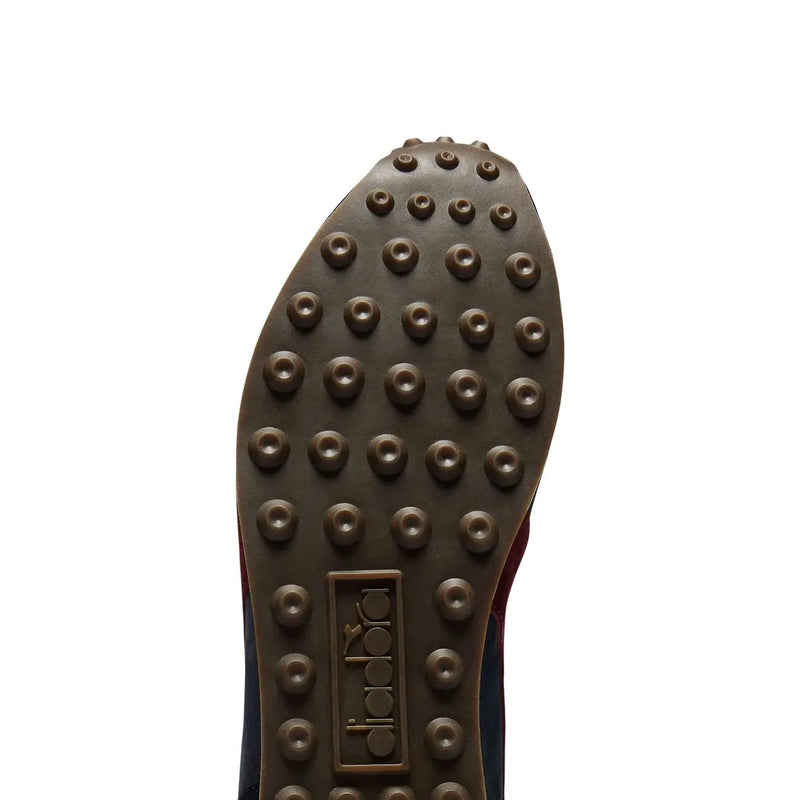 Braune Gummisohle mit runden Stollen und diadora eingeprägtes Logo diadora Herren-Sneaker, blaues Leder, Rallye-Wachsschuhe