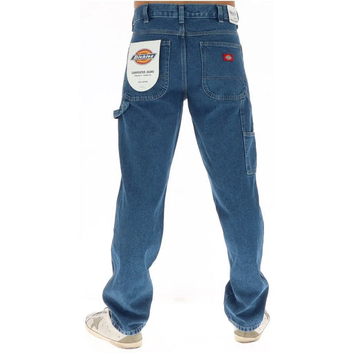 Dickies jeans carpenter jeans for men in blue with cargo pockets and red brand patch, back view
