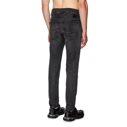 Diesel black cotton elastane slim-fit jeans for men in dark gray with faded distressed texture and subtle whiskering details