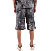 Diesel Baumwollshorts für Herren in Schwarz und Weiß mit Used-Look und Rissen, Vorderansicht