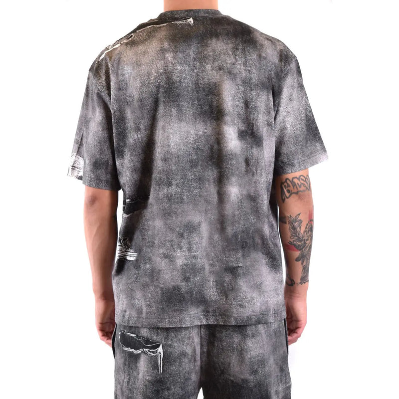 Diesel men black cotton t shirt with gray and black tie-dye and distressed ripped details on sleeves back and hem visible