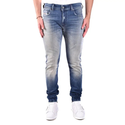 Diesel men blue cotton jeans with worn effect featuring faded gradient wash and subtle distressing details