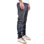 Diesel men jeans in dark blue worn out effect with slim fit and distressed details made of 100 cotton
