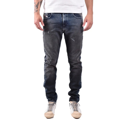 Diesel men jeans in dark blue slim fit with worn out effect made from 100 percent cotton denim fabric