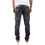 Back side of dark-wash diesel men jeans with blue worn out effect made from 100 cotton featuring distressed look