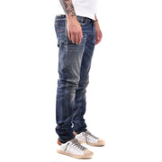 Dark-wash denim slim fit Diesel men jeans in cotton elastane with subtle fading and red logo on back pocket