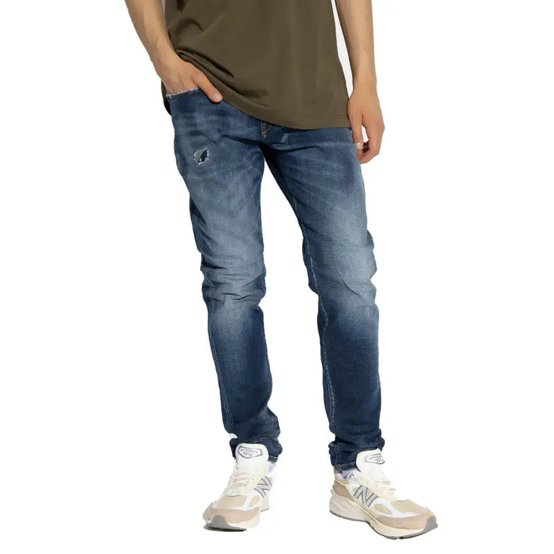 Diesel men jeans in dark-wash blue cotton lyocell with slim fit and subtle thigh distressing for a worn out effect