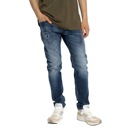 Diesel men jeans in dark-wash blue cotton lyocell with slim fit and subtle thigh distressing for a worn out effect