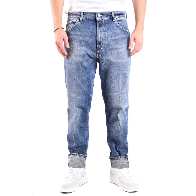 Dondup jeans for men in blue denim with faded wash and rolled cuffs, front view