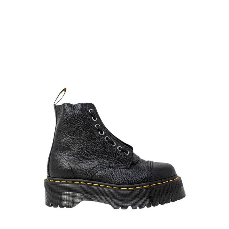 Schwarze, genarbte Leder-Ankle-Boots für Damen von Dr. Martens, von hinten gesehen