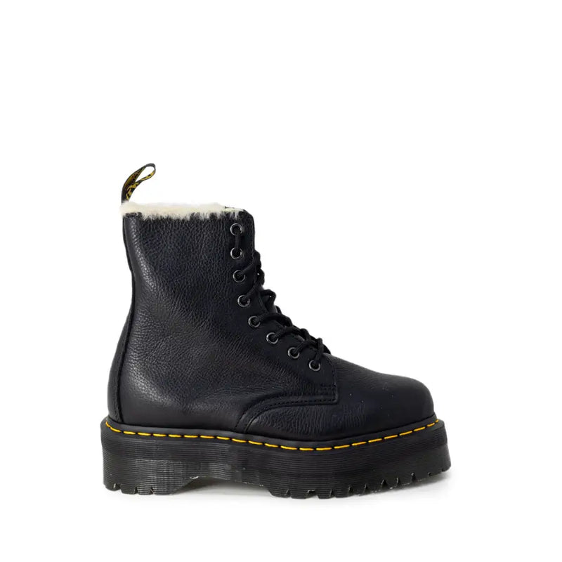Dr Martens black leather ankle boots for women shown from the back side featuring durable leather material