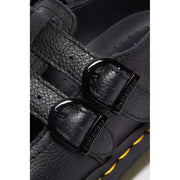 Dr Martens black leather slip on sandals with two shiny black buckles and yellow stitching along the sole size 3