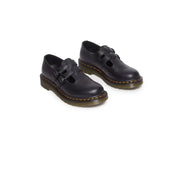 Dr Martens black leather slip on shoes size 3 showing the back side of the footwear