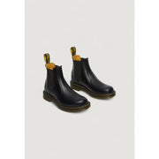 Black leather dr martens men boots in polyester suitable for spring summer with model number 22227001 shown from the back