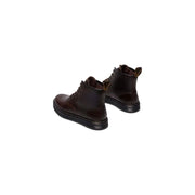 Dark brown leather dr martens men brookline chukka boots showing the back side of the footwear