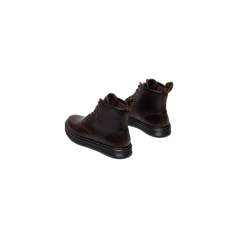 Dark brown leather dr martens men brookline chukka boots showing the back side of the footwear