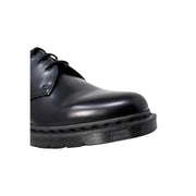 Dr Martens men lace up shoes in black leather size 3 shown from the back side with durable stitching details
