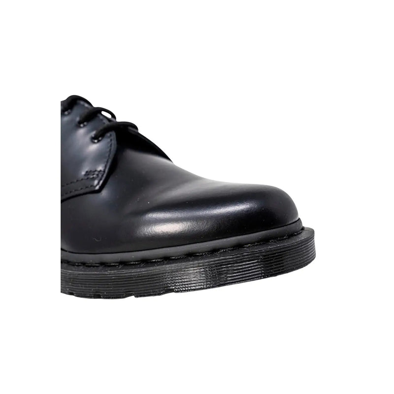 Dr Martens men lace up shoes in black leather size 3 shown from the back side with durable stitching details