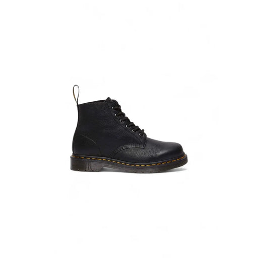 Black leather dr martens men lace up boots showing the back side with signature stitching and pull tab