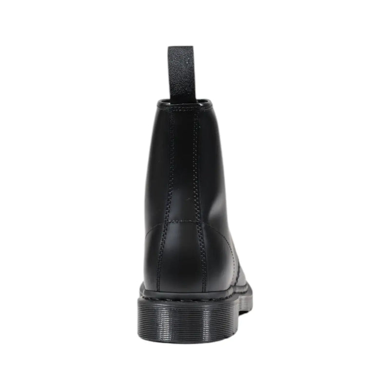 Black leather dr martens men lace up boots showing the back side with durable sole and yellow stitching