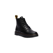 Schwarze Dr. Martens Herren-Chukka-Boots aus Leder, von hinten gesehen, wobei die glatte Lederverarbeitung und die Knöchelhöhe hervorgehoben werden.
